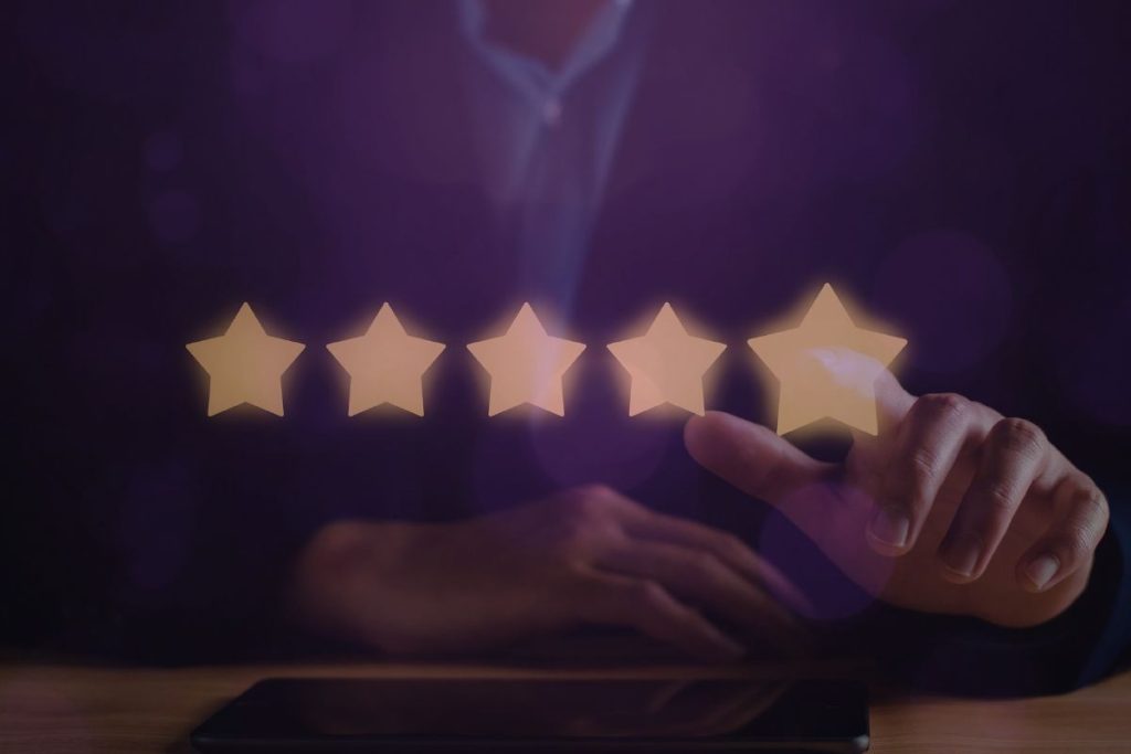 Five star review rating glowing under deep purple overlay symbolizing devotion and control